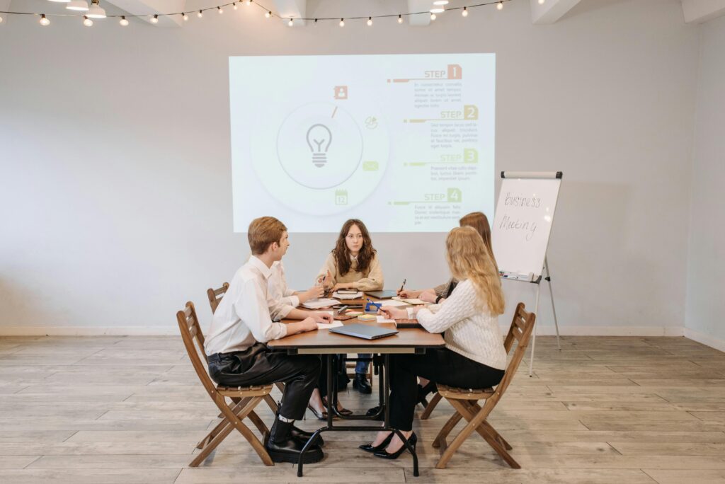 Business team discussing new strategies in a collaborative meeting environment.